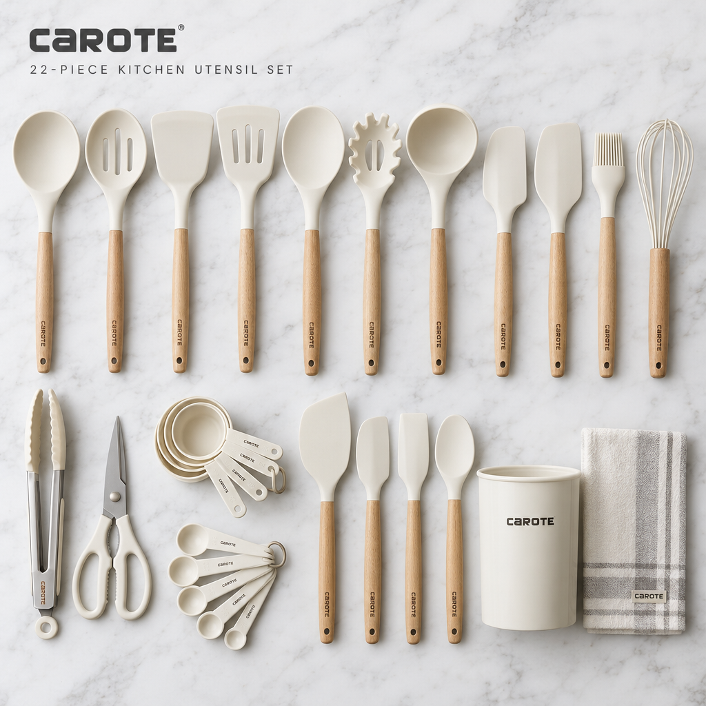CAROTE 22-piece cream white silicone kitchen utensil set with natural wood handles laid flat on white marble
